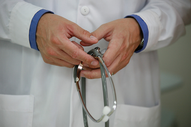 doctor holding stethoscope 